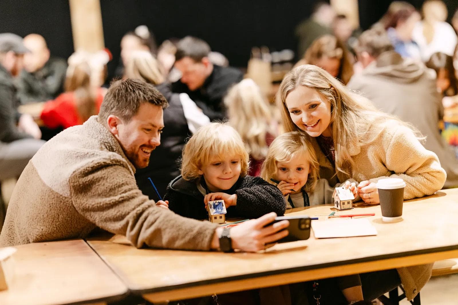 A family taking a selfie together during the Christmas at Bewl Water quest
