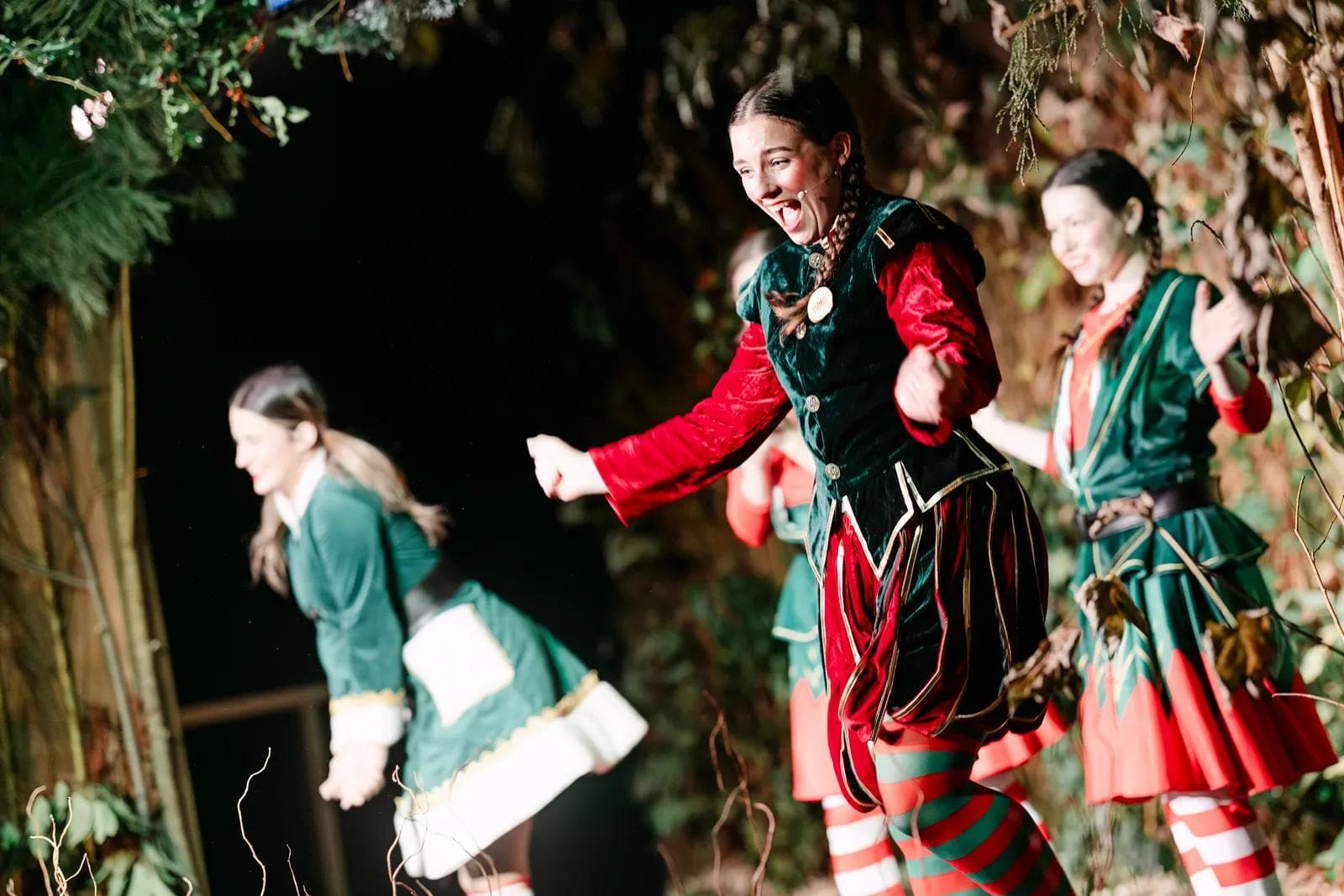 Elf performers dancing in the live interactive show at Christmas at Bewl Water